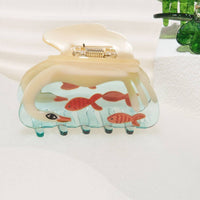 White Swan Hair Claw in Crystal Clear Blue Acetate - Parkette.
