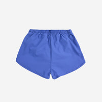 A Day At The Beach Swim Trunks - Parkette.