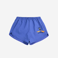 A Day At The Beach Swim Trunks - Parkette.